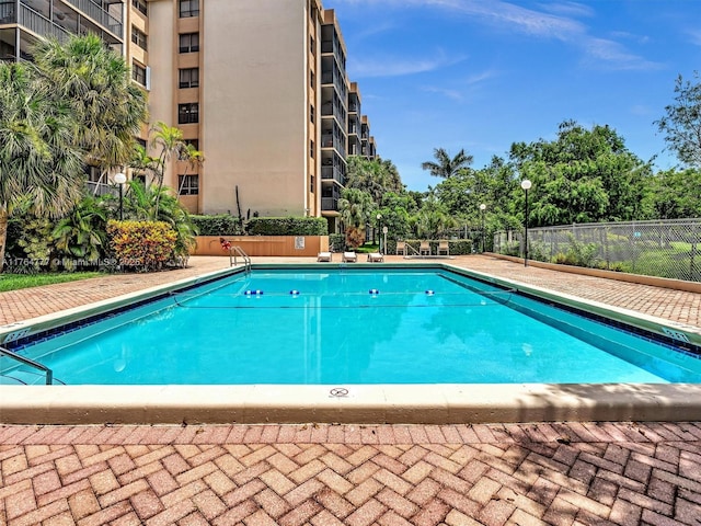 900 NE 195th St Unit 504, Miami, FL 33179 - community pool featuring fence