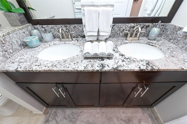 747 NE 193rd Ter, Miami, FL 33179 - bathroom featuring a sink and double vanity