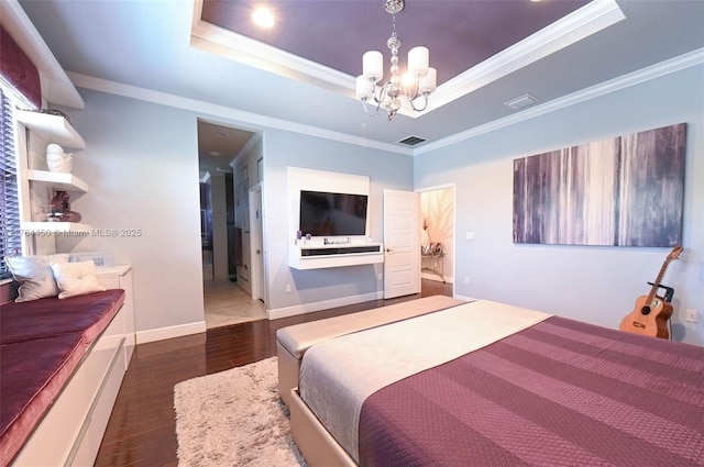 747 NE 193rd Ter, Miami, FL 33179 - bedroom with visible vents, a notable chandelier, a tray ceiling, wood finished floors, and crown molding