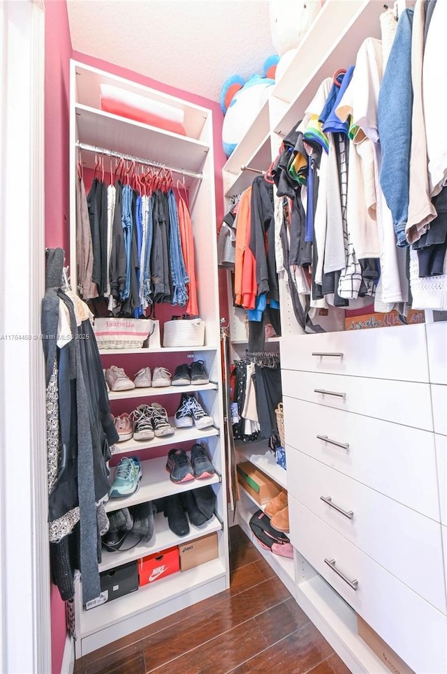 747 NE 193rd Ter, Miami, FL 33179 - walk in closet featuring wood finished floors