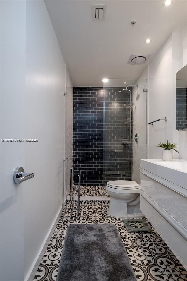 full bath featuring visible vents, toilet, a stall shower, recessed lighting, and vanity