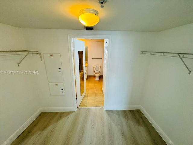 1750 N Bayshore Dr Unit 1606, Miami, FL 33132 - walk in closet featuring wood finished floors
