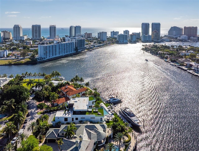 bird's eye view with a view of city and a water view