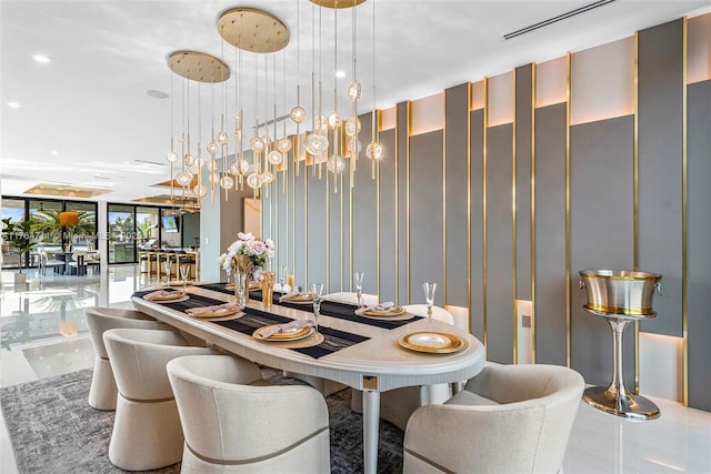 dining room with recessed lighting and floor to ceiling windows