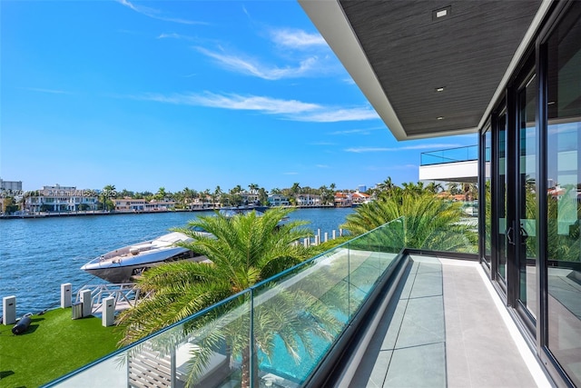 balcony featuring a water view