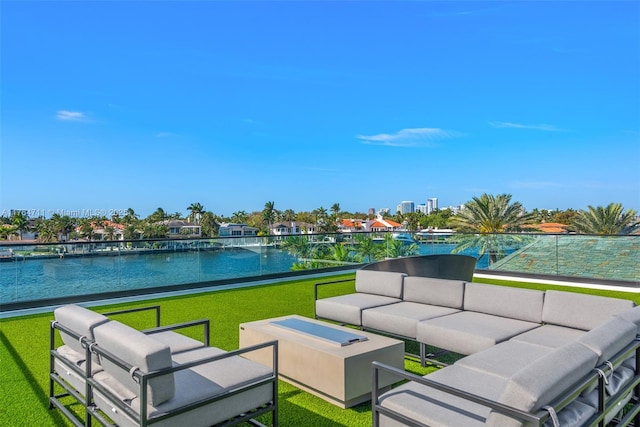 view of patio with a water view and an outdoor hangout area