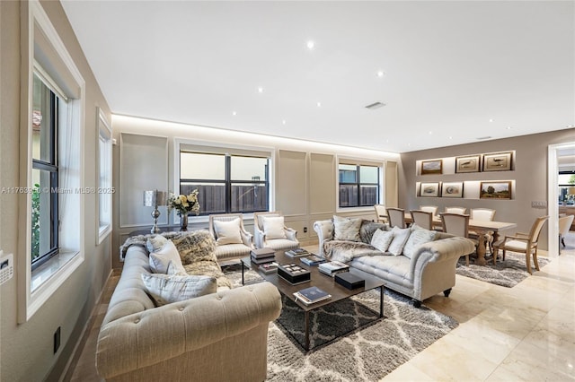 9835 NW 86th Ter, Doral, FL 33178 - living room featuring recessed lighting, visible vents, and marble finish floor