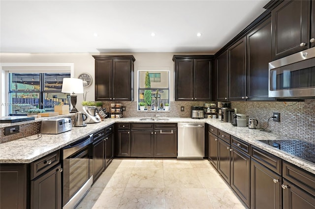 9835 NW 86th Ter, Doral, FL 33178 - kitchen with decorative backsplash, wine cooler, appliances with stainless steel finishes, and a sink