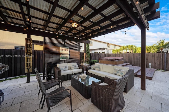 9835 NW 86th Ter, Doral, FL 33178 - view of patio with a hot tub, outdoor lounge area, and a fenced backyard