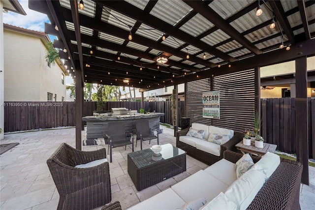9835 NW 86th Ter, Doral, FL 33178 - view of patio with exterior kitchen, grilling area, a fenced backyard, and an outdoor hangout area