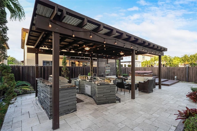 9835 NW 86th Ter, Doral, FL 33178 - view of patio with an outdoor kitchen, a grill, a pergola, and a fenced backyard