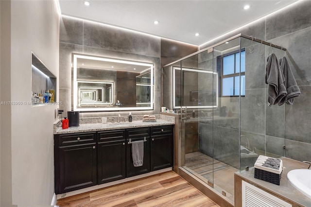 9835 NW 86th Ter, Doral, FL 33178 - bathroom with vanity, recessed lighting, wood finished floors, and a stall shower