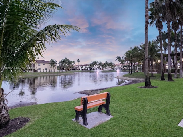 9835 NW 86th Ter, Doral, FL 33178 - view of community featuring a yard and a water view