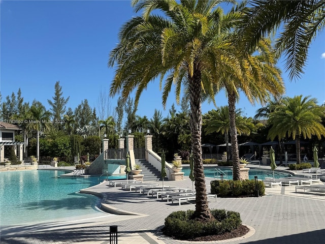 9835 NW 86th Ter, Doral, FL 33178 - aerial view at dusk with a water view and a residential view