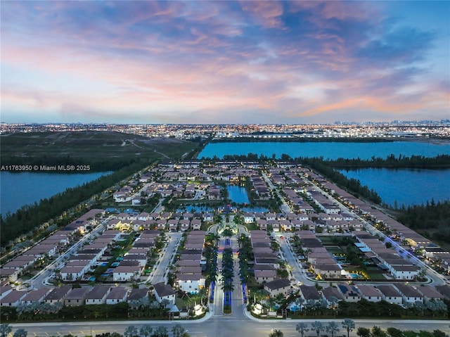 9835 NW 86th Ter, Doral, FL 33178 - aerial view at dusk with a water view