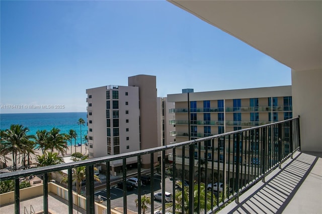 balcony featuring a water view