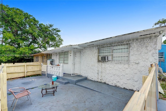 7501 NW 6th Ct, Miami, FL 33150 - back of house with a fenced backyard and stucco siding
