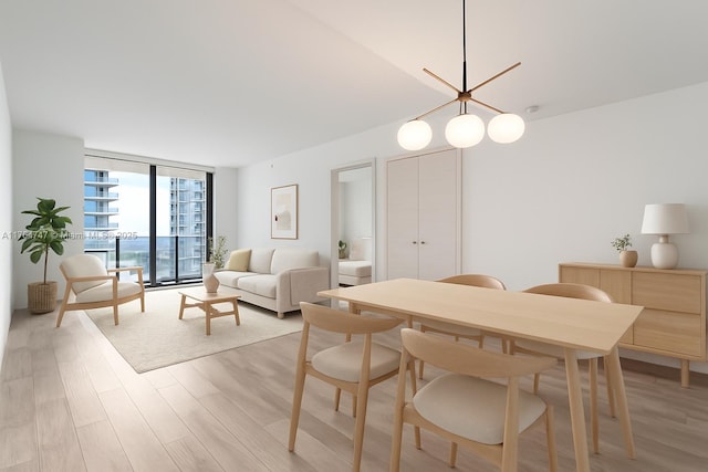 801 S Miami Ave Unit 3110, Miami, FL 33130 - dining area with expansive windows and light wood-style floors