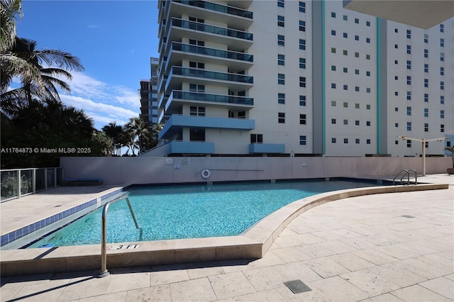community pool with fence