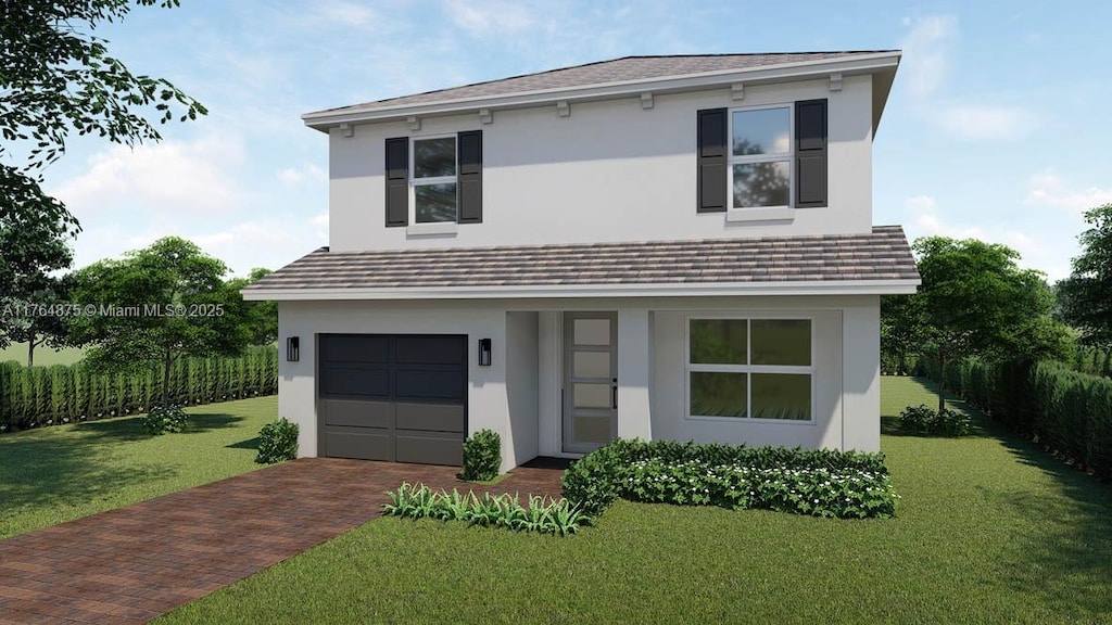 view of front of house with stucco siding, decorative driveway, fence, a front lawn, and an attached garage