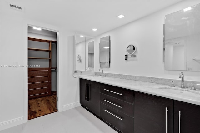 600 Grapetree Dr Unit 8Cs, Key Biscayne, FL 33149 - bathroom with baseboards, double vanity, recessed lighting, and tile patterned floors
