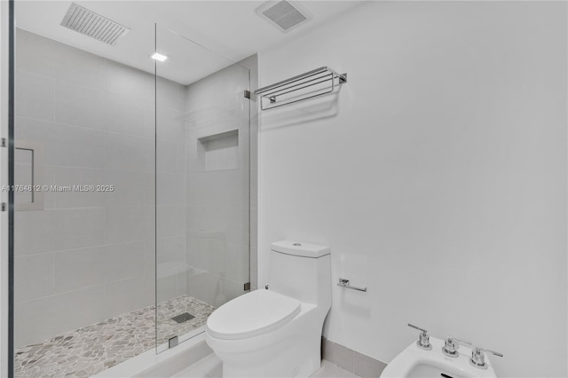 600 Grapetree Dr Unit 8Cs, Key Biscayne, FL 33149 - full bath featuring tiled shower, a bidet, and toilet