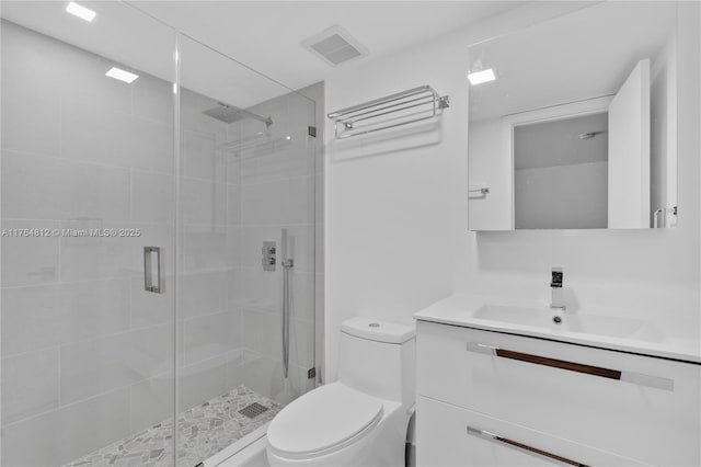 600 Grapetree Dr Unit 8Cs, Key Biscayne, FL 33149 - full bathroom featuring toilet, a stall shower, and vanity