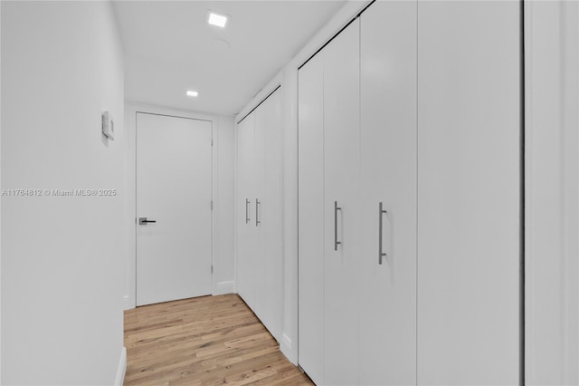 600 Grapetree Dr Unit 8Cs, Key Biscayne, FL 33149 - hallway featuring light wood-type flooring