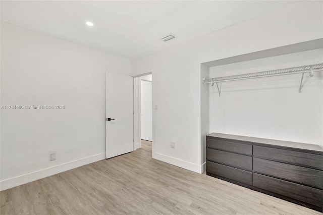 843 SW 20th St, Fort Lauderdale, FL 33315 - unfurnished bedroom featuring wood finished floors, visible vents, and baseboards