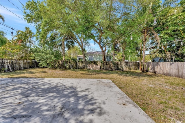 843 SW 20th St, Fort Lauderdale, FL 33315 - view of yard featuring a patio area and a fenced backyard
