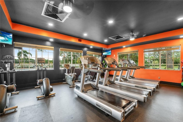 4261 SW 126th Ave, Miramar, FL 33027 - exercise room featuring a raised ceiling, recessed lighting, and baseboards