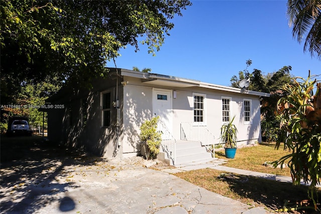 exterior space with stucco siding