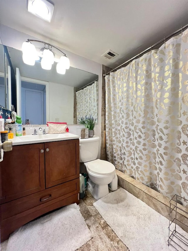 1101 Crystal Lake Dr Unit 602, Deerfield Beach, FL 33064 - full bath with a shower with shower curtain, visible vents, toilet, and vanity