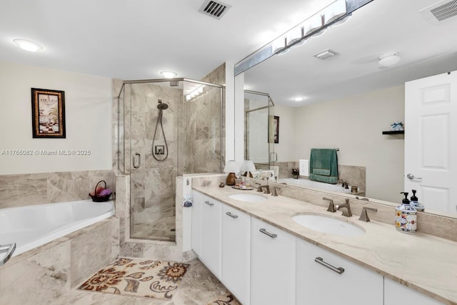 full bath featuring double vanity, visible vents, a garden tub, and a sink