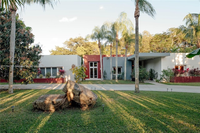 12301 SW 107th Ave, Miami, FL 33176 - view of front of home featuring stucco siding and a front lawn
