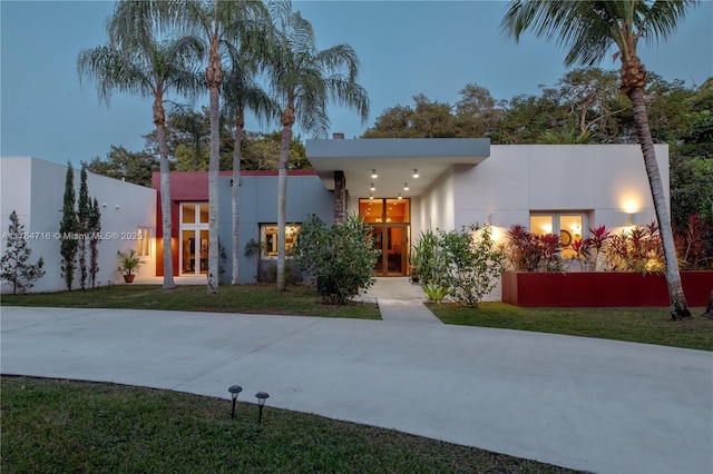 12301 SW 107th Ave, Miami, FL 33176 - view of front of house with stucco siding and a front lawn