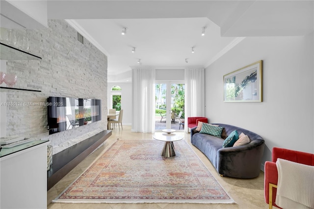 living area with ornamental molding
