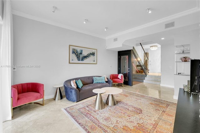 living room with stairway, baseboards, visible vents, and crown molding