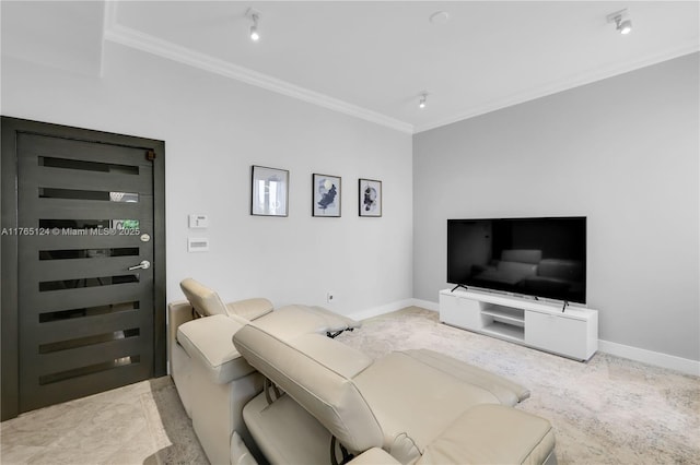 living room with baseboards and ornamental molding