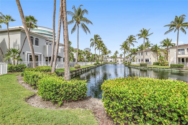 property view of water featuring a residential view and fence