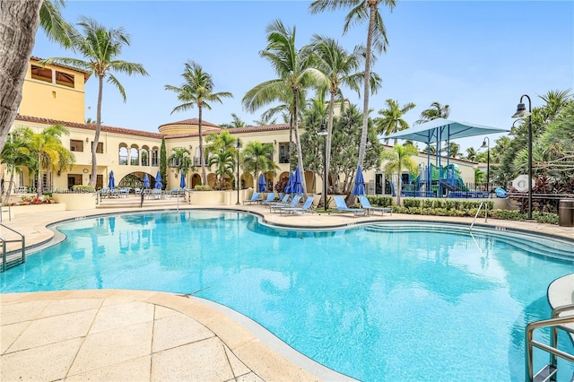 pool featuring a patio area
