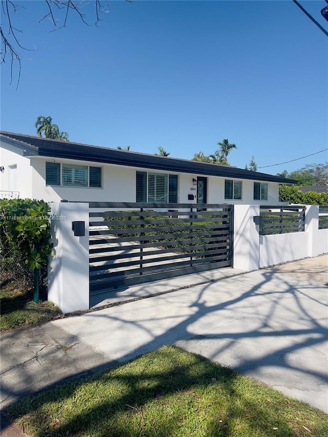 8841 SW 54th St, Miami, FL 33165 - single story home featuring a fenced front yard and a gate
