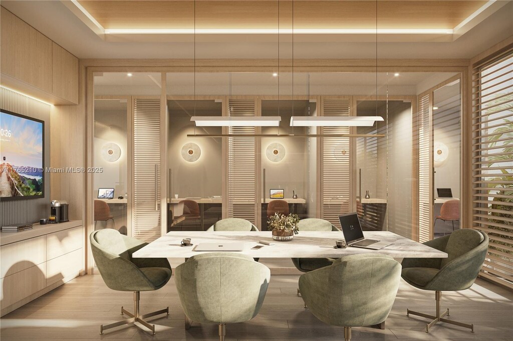 1776 Polk St Unit 1006, Hollywood, FL 33020 - dining space featuring wood finished floors and an office area