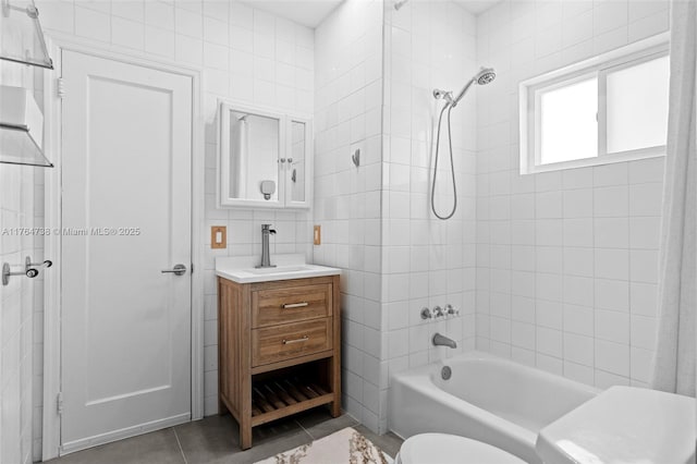 bathroom featuring tile walls, tile patterned floors,  shower combination, toilet, and vanity