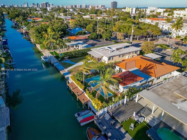 view of urban area with a nearby body of water