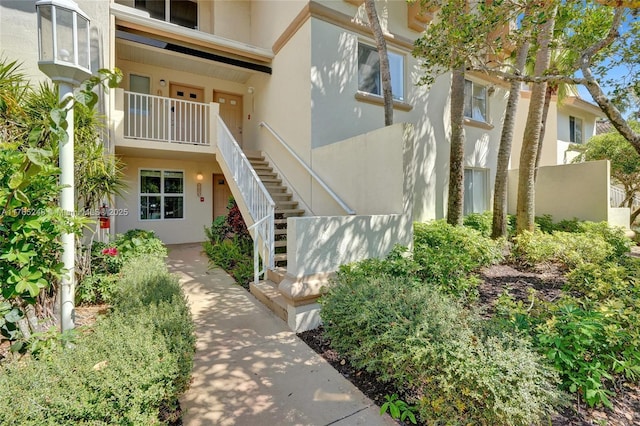 view of property with stairway