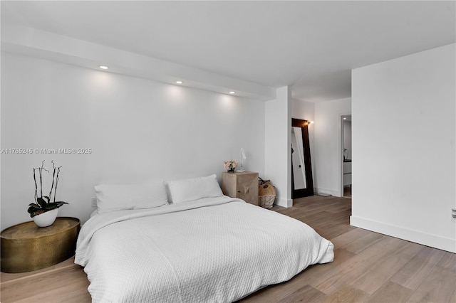 4000 NE 170th St Unit 300, North Miami Beach, FL 33160 - bedroom featuring recessed lighting, baseboards, and wood finished floors