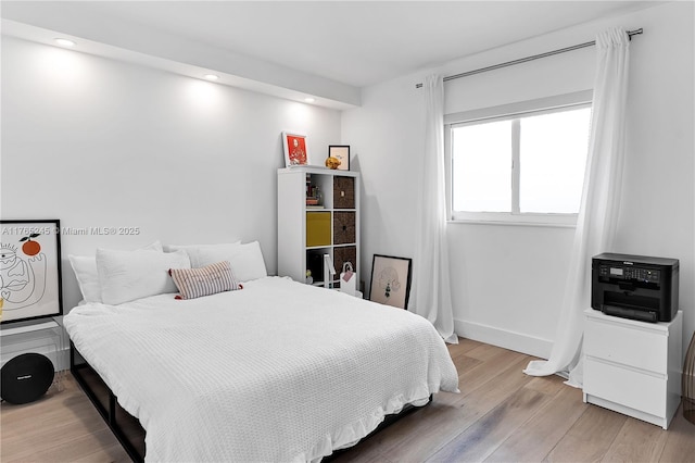 4000 NE 170th St Unit 300, North Miami Beach, FL 33160 - bedroom featuring recessed lighting, light wood-type flooring, and baseboards