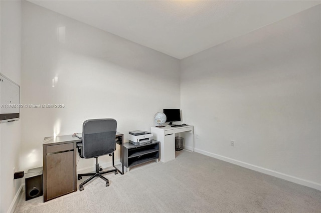 carpeted office with baseboards