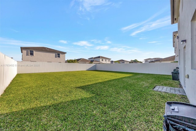 view of yard featuring a fenced backyard
